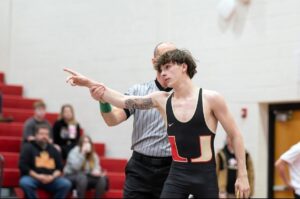 UHS senior Kaden Nieman still filling role with wrestling team despite injury